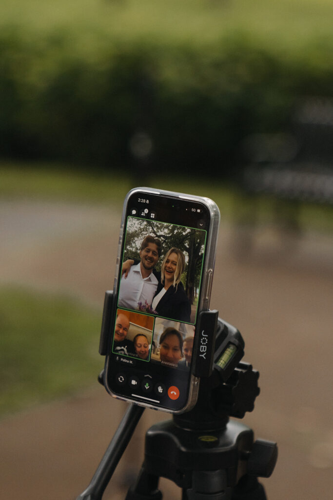 Phone screen showing Polina’s family FaceTiming into the Minnesota elopement.