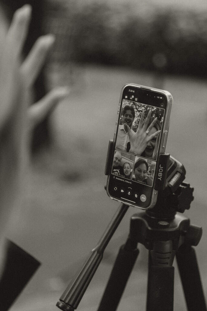 Close-up of FaceTime showing bride’s family joining the Irvine Park wedding from afar.