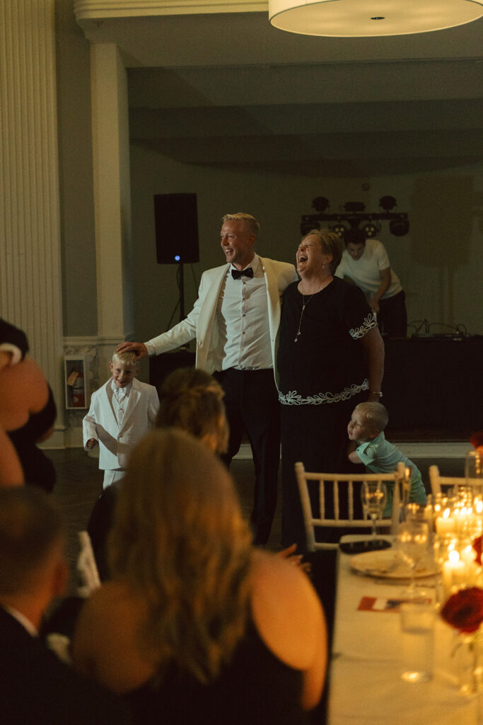 Groom dancing with his mother during a timeless Minnesota wedding reception.