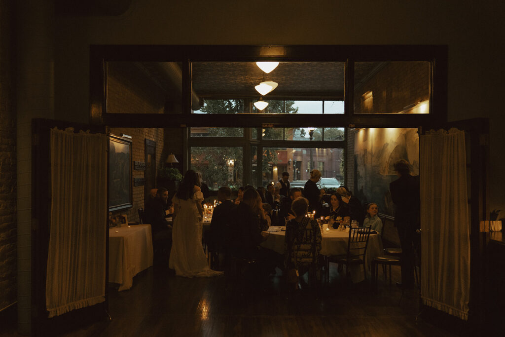 Cozy, low-light vintage wedding reception at WA Frost and Company in Saint Paul, MN