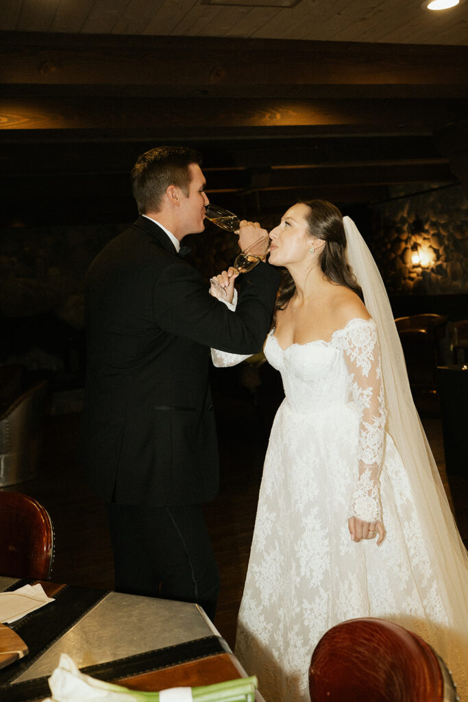 Newlyweds enjoy a private cocktail before signing their marriage license