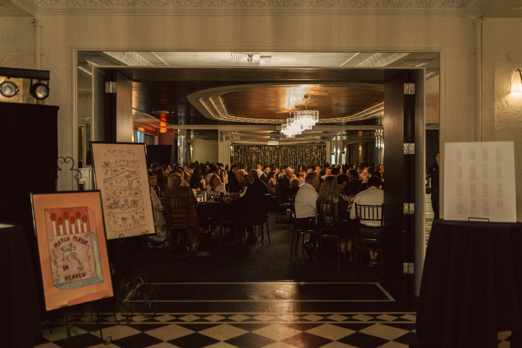 Wedding guests enjoy their dinners at The Commodore historic wedding venue in Saint Paul, Minnesota